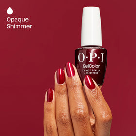 OPI swatch on hand displaying opaque dark red color and salon finish