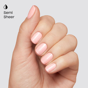 Hands wearing Glazed Donut on natural nails showing wearable pink elegance benefit