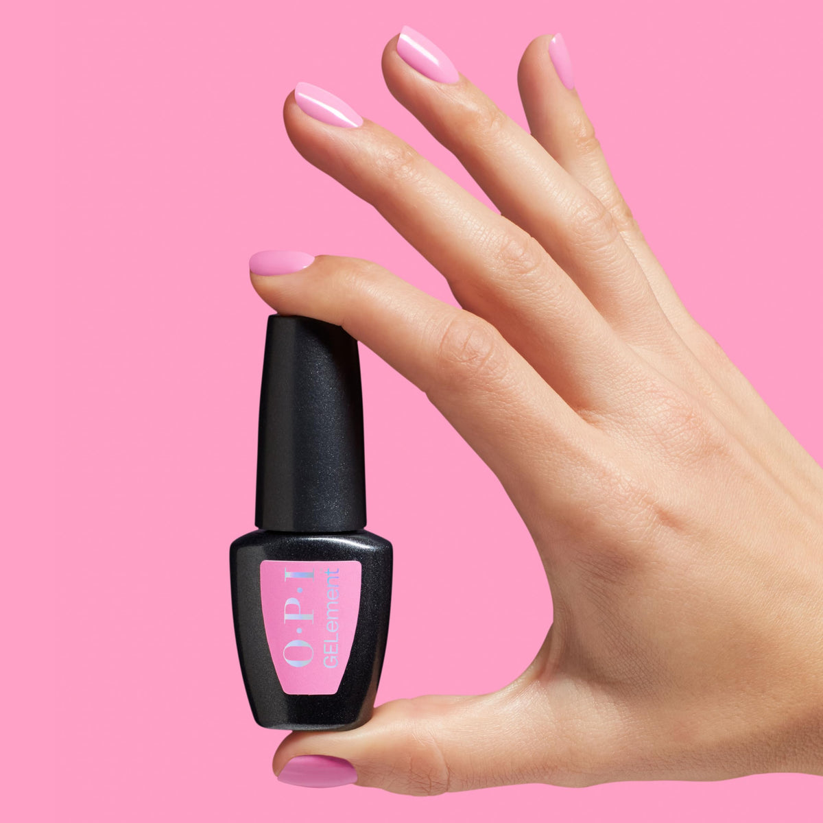 OPI lifestyle wristshot with Pink-atude showing polished look benefit
