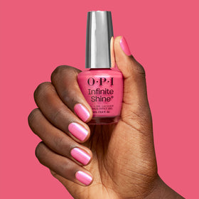 OPI polish being applied to a nail showing easy even coverage benefit