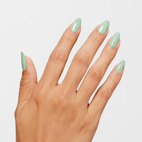 OPI swatch of In Mint Condition on forearm showing opaque color payoff