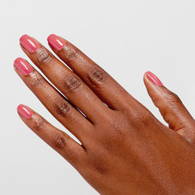 OPI swatch on nail tips showing true opaque pink coverage and salon look benefit