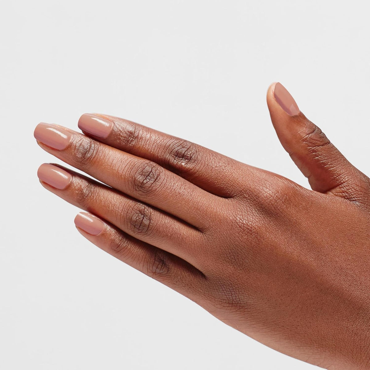 OPI on-hand lifestyle shot wearing Barefoot in Barcelona for everyday elegance