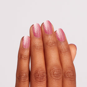 OPI painted nails in sunlight showing long-lasting gel-like glossy wear