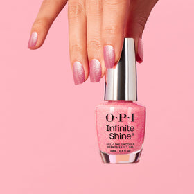 OPI manicure lifestyle on hands holding clutch demonstrating elegant sparkle
