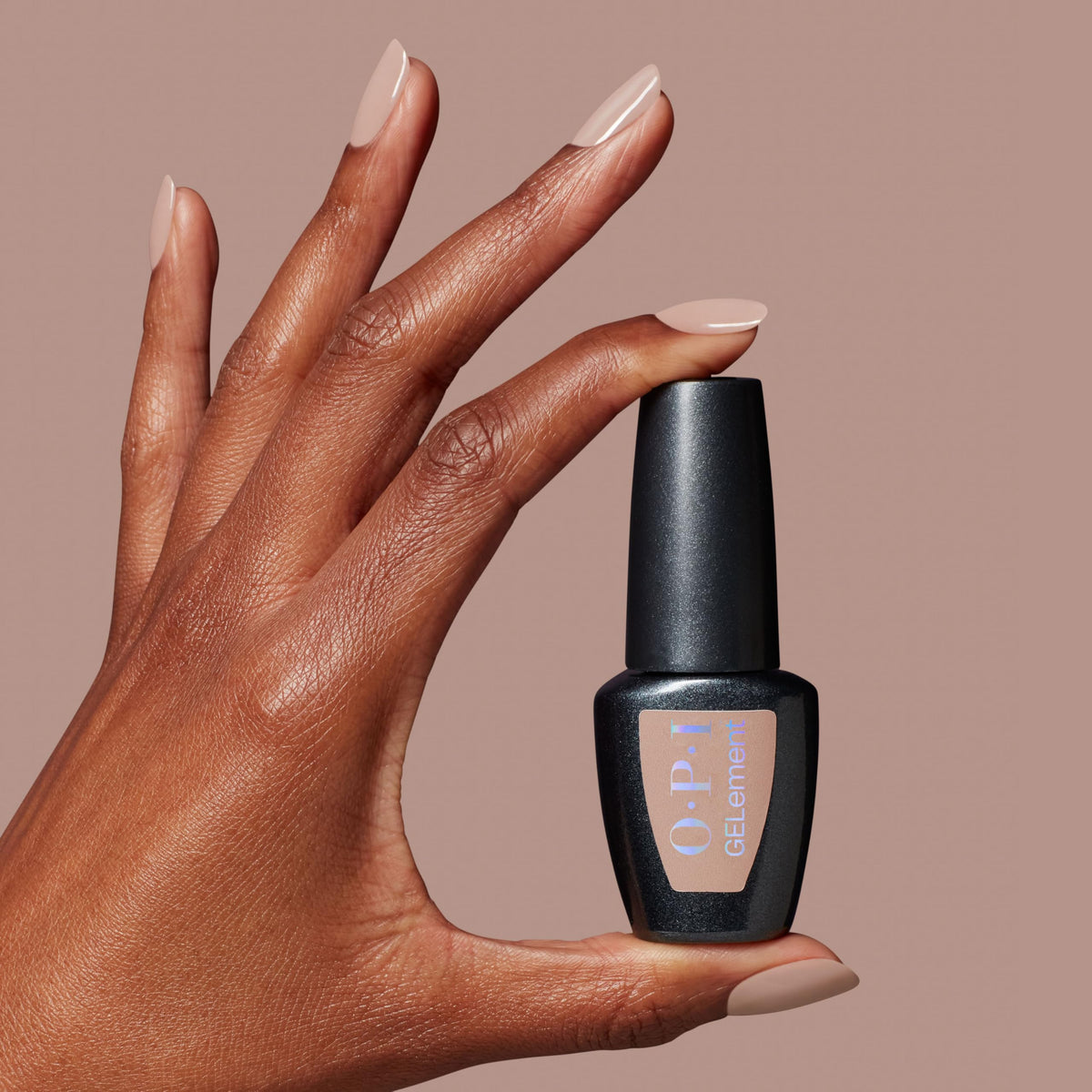 Lifestyle photo of OPI Just Got Leid on natural nails with polished look