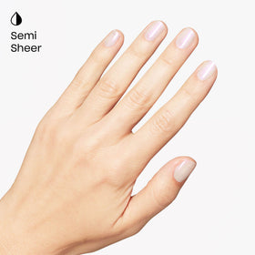OPI swatch on fingertips showing semi-sheer pearlescent finish and wearable glow
