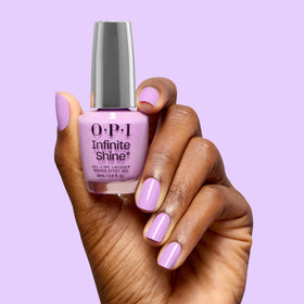 OPI bottle in hand for scale showing compact size and easy handling benefit