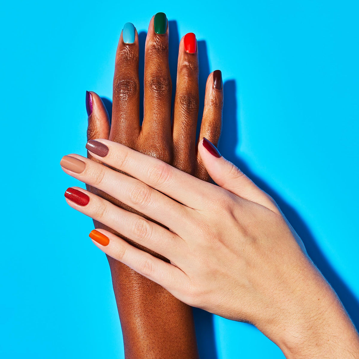 OPI lifestyle photo with fall outfit showcasing how the shades complement seasonal looks