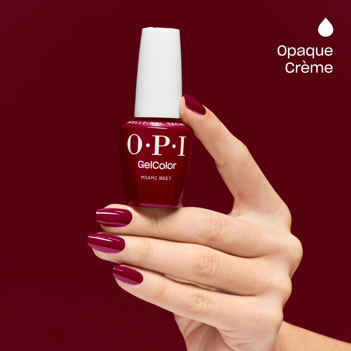 OPI Miami Beet being applied to a nail with smooth self-leveling formula visible