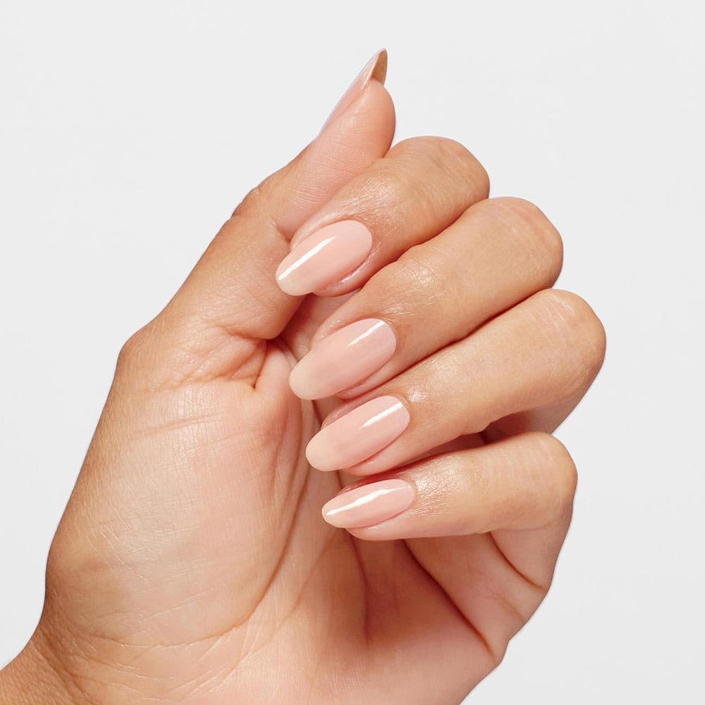OPI Mirror Shine bottle beside a hand for size scale and easy-use benefit