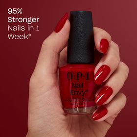 OPI brush stroke of Big Apple Red demonstrating smooth opaque coverage benefit