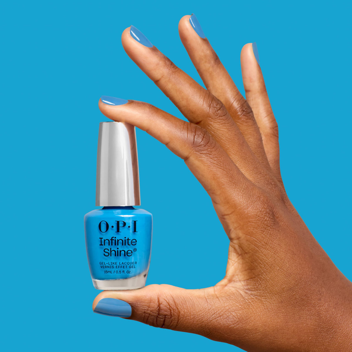 OPI painted fingernails in No Summer Blues demonstrating long-lasting shine