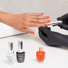 OPI Shock Em Orange lifestyle beach outfit photo shows seasonal styling and vibrant statement benefit