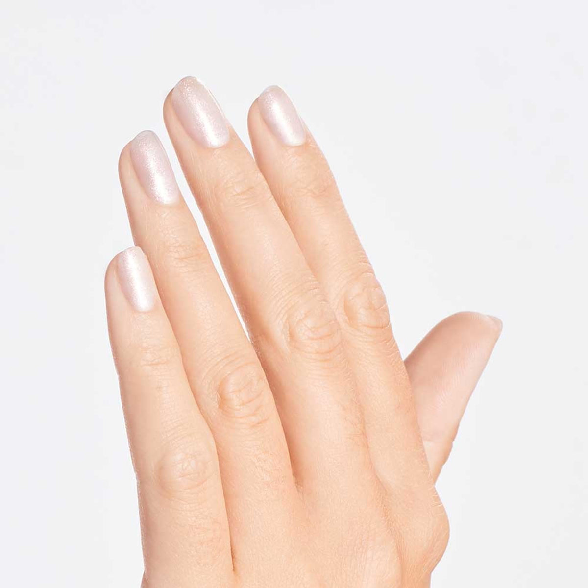 Hand holding coffee showing OPI nails with long-lasting gloss and elegance