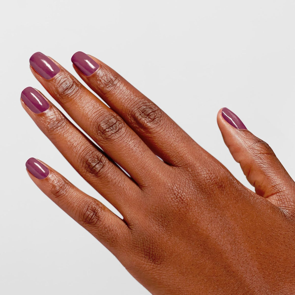 OPI Times Infinity applied on nails in lifestyle setting for long-lasting shine