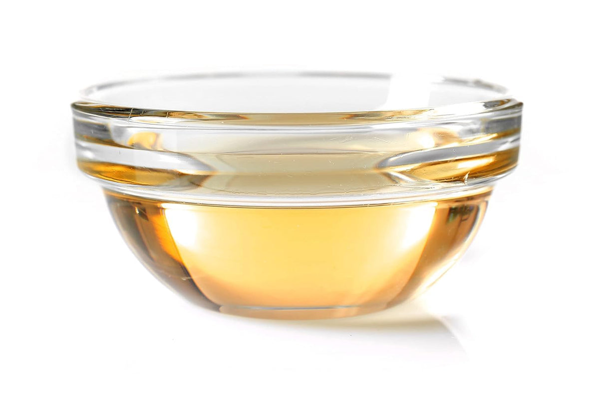 Applying OPO oil to hair ends to show shine restoration and frizz control benefit