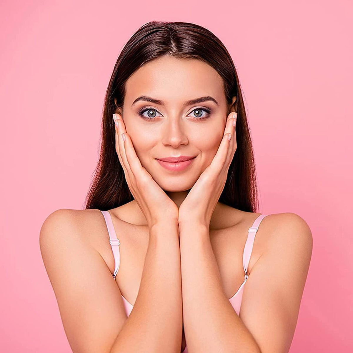 OPO misting rose hydrosol into hand to hydrate skin and provide instant refreshment