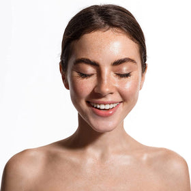 OPO squalane oil on hair ends showing smoothing and shine benefit