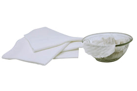 Organic Cotton Mart folded stack in bathroom lifestyle promoting sustainable routine