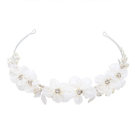 Oriamour close-up of tulle and pearls highlighting delicate texture and refined detail