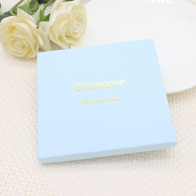 Oriamour styled on wedding table setting suggesting coordination with bridal accessories