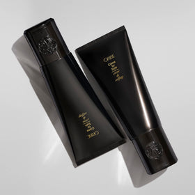 Oribe applied to straight hair showing added shine and natural movement benefit