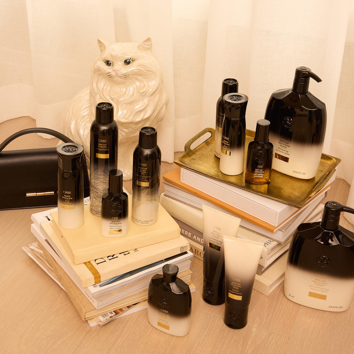 Oribe Balm D'Or ingredient display with botanicals highlighting nourishing benefits