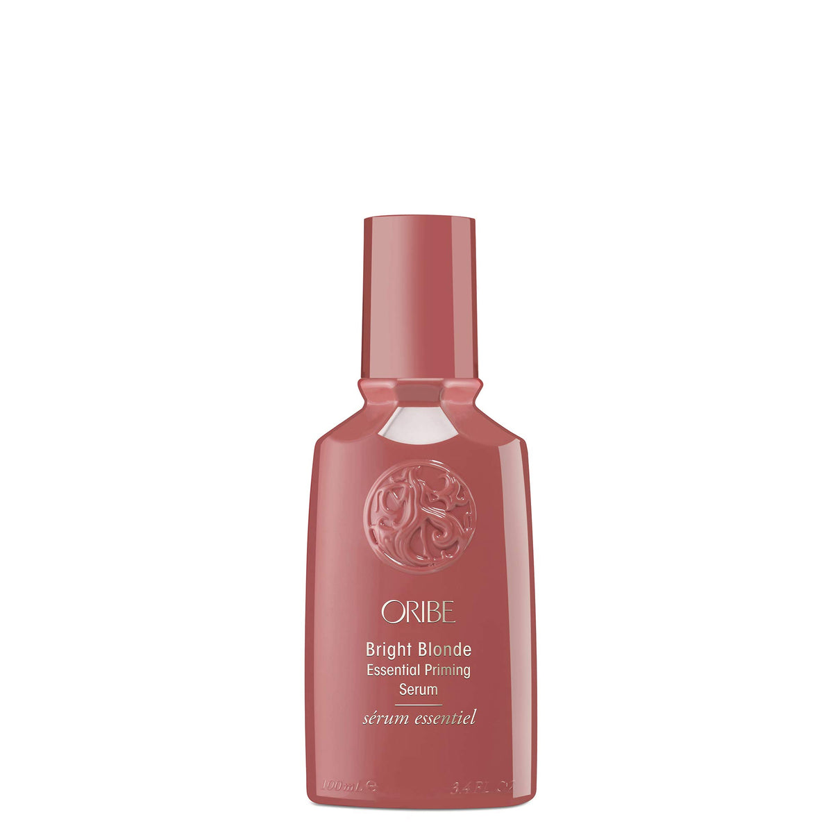 ORIBE front bottle shot showing sleek packaging and brightening benefits