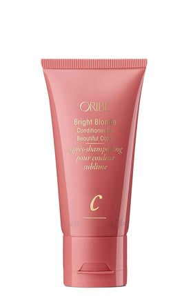 Oribe bottle front packaging showing label and travel size benefit