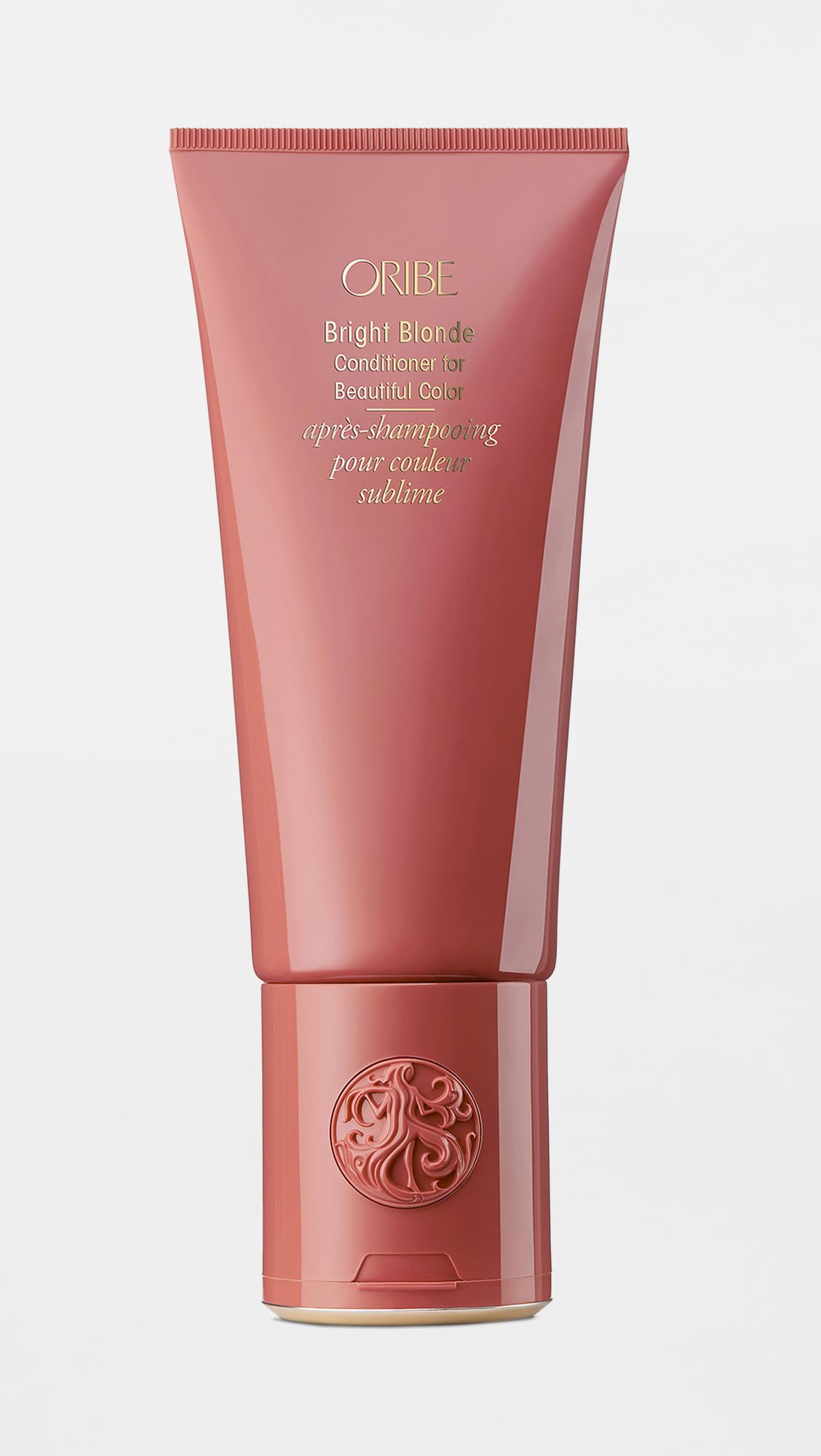 Oribe Bright Blonde conditioner on bathroom shelf showing salon-ready results