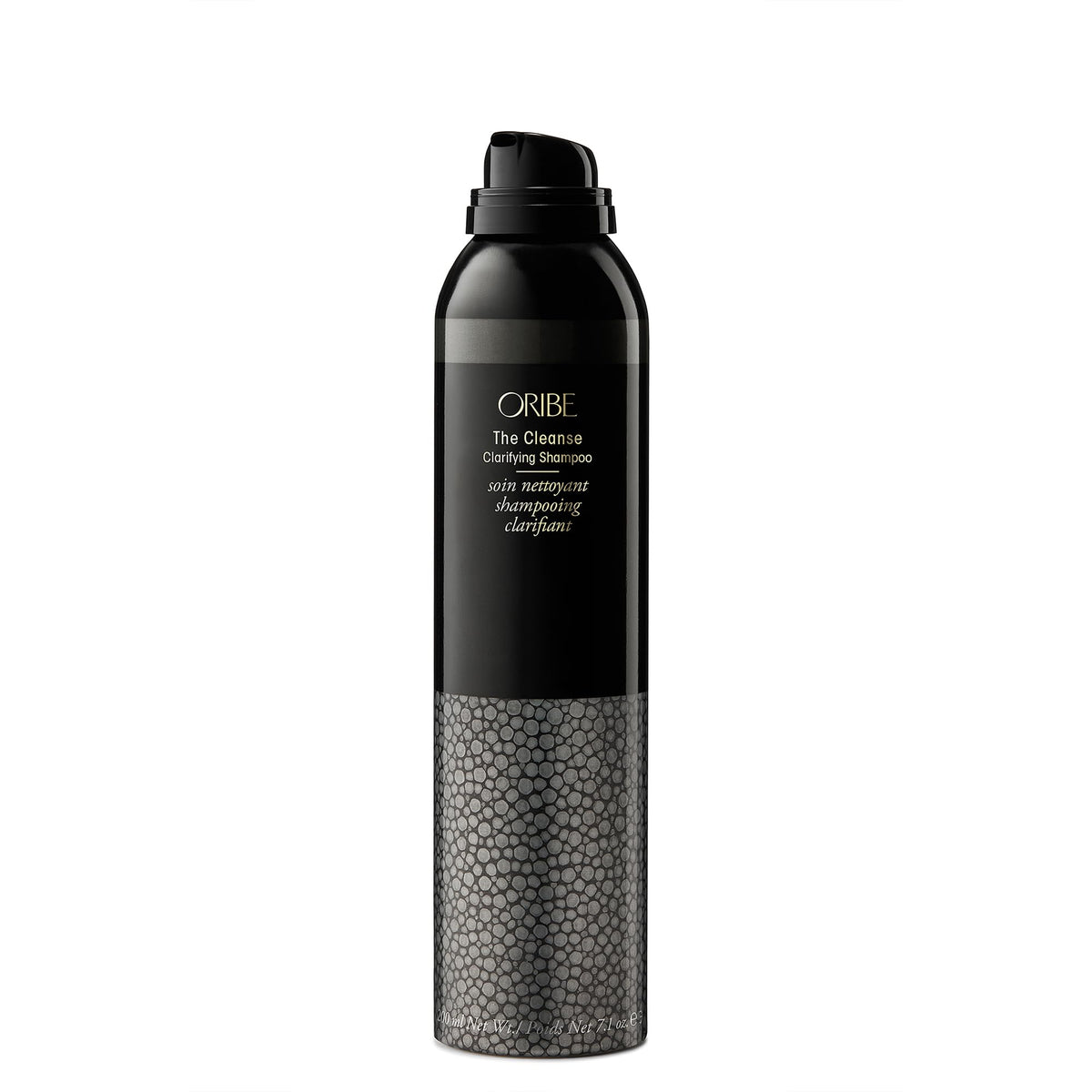 ORIBE size and scale comparison with hand to show the 7.1 fl oz travel-friendly can