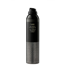 ORIBE size and scale comparison with hand to show the 7.1 fl oz travel-friendly can