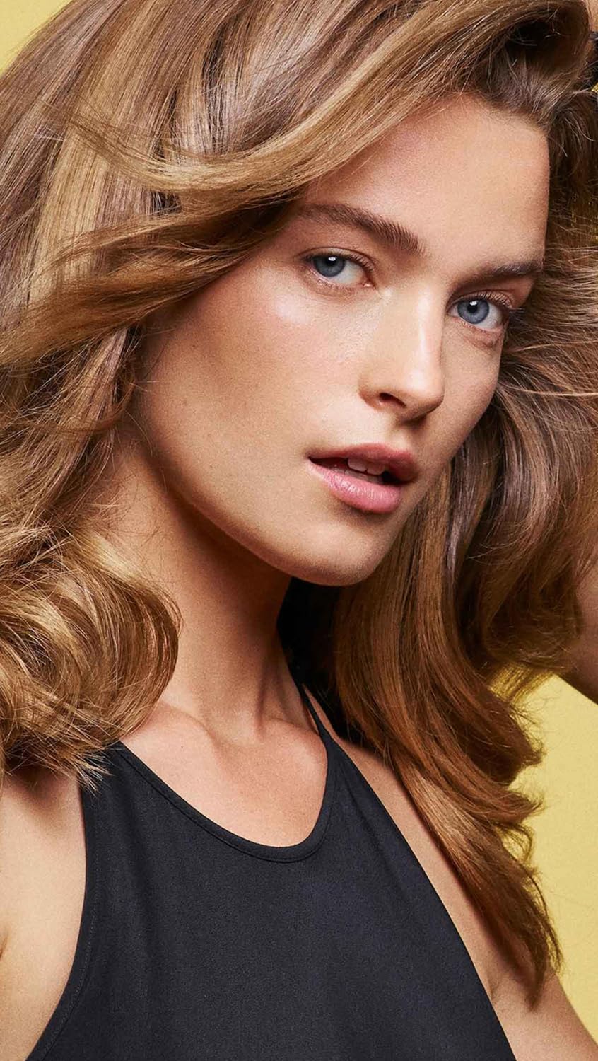 Oribe hair after use showing smooth, frizz-free results