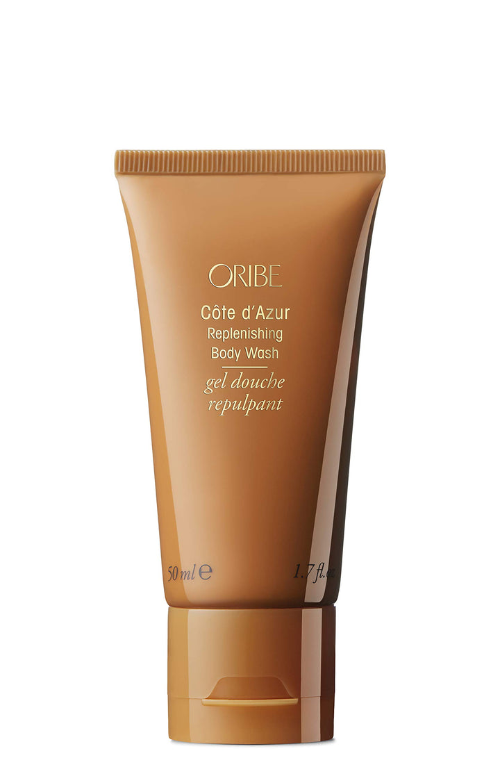 Oribe Cote d'Azur front packaging showing compact travel bottle and elegant label, handbag-ready