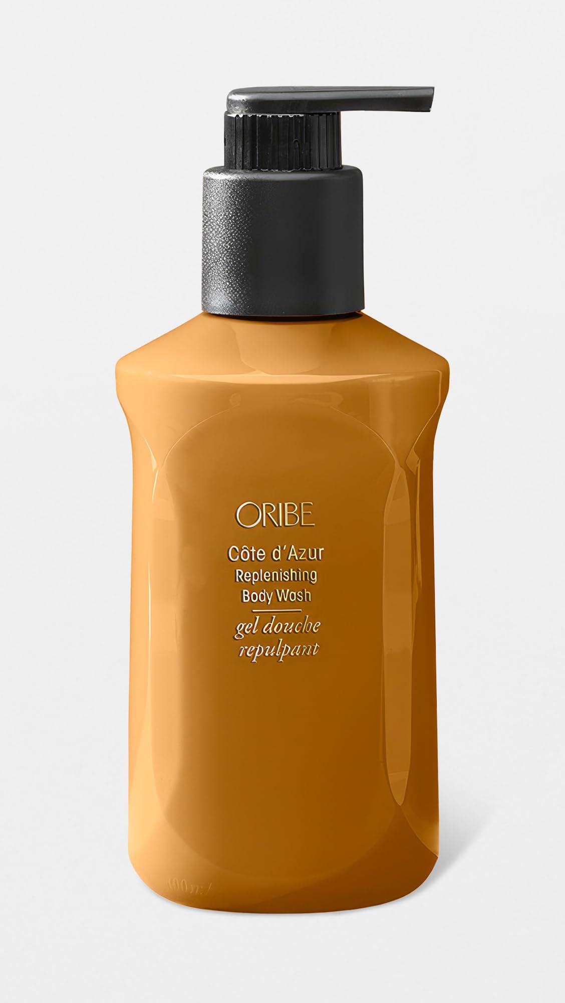 ORIBE pearlescent texture on hand demonstrating creamy lather and hydration