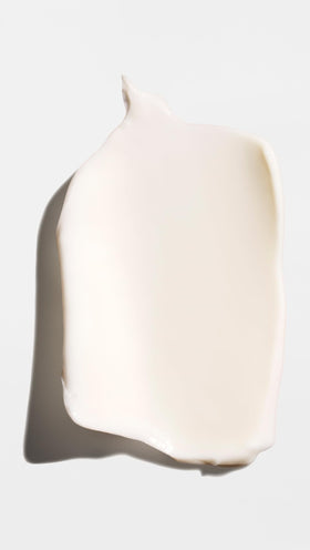 ORIBE dispensing cream into hand demonstrating smooth application benefit