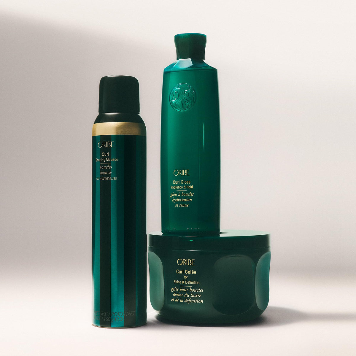 ORIBE 5.9 fl oz bottle next to ruler showing size and portability