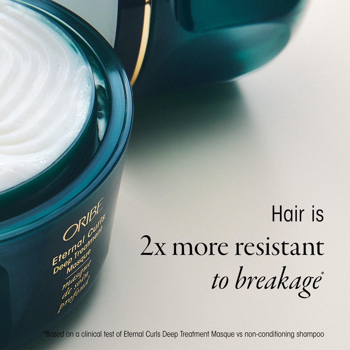 Oribe Eternal Curls being applied to damp hair demonstrating easy detangling benefit