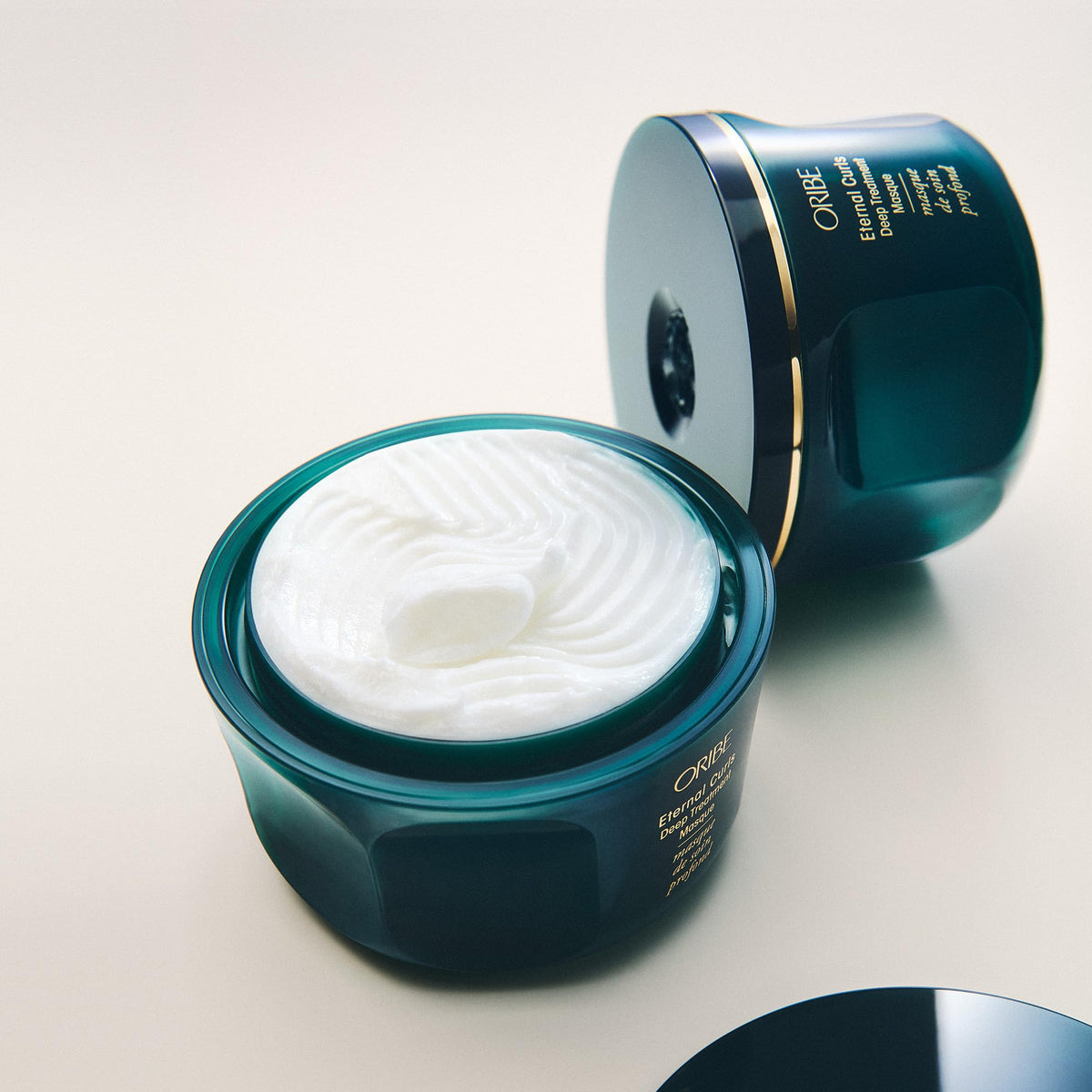 Oribe Eternal Curls before and after curly hair results showing smoother definition