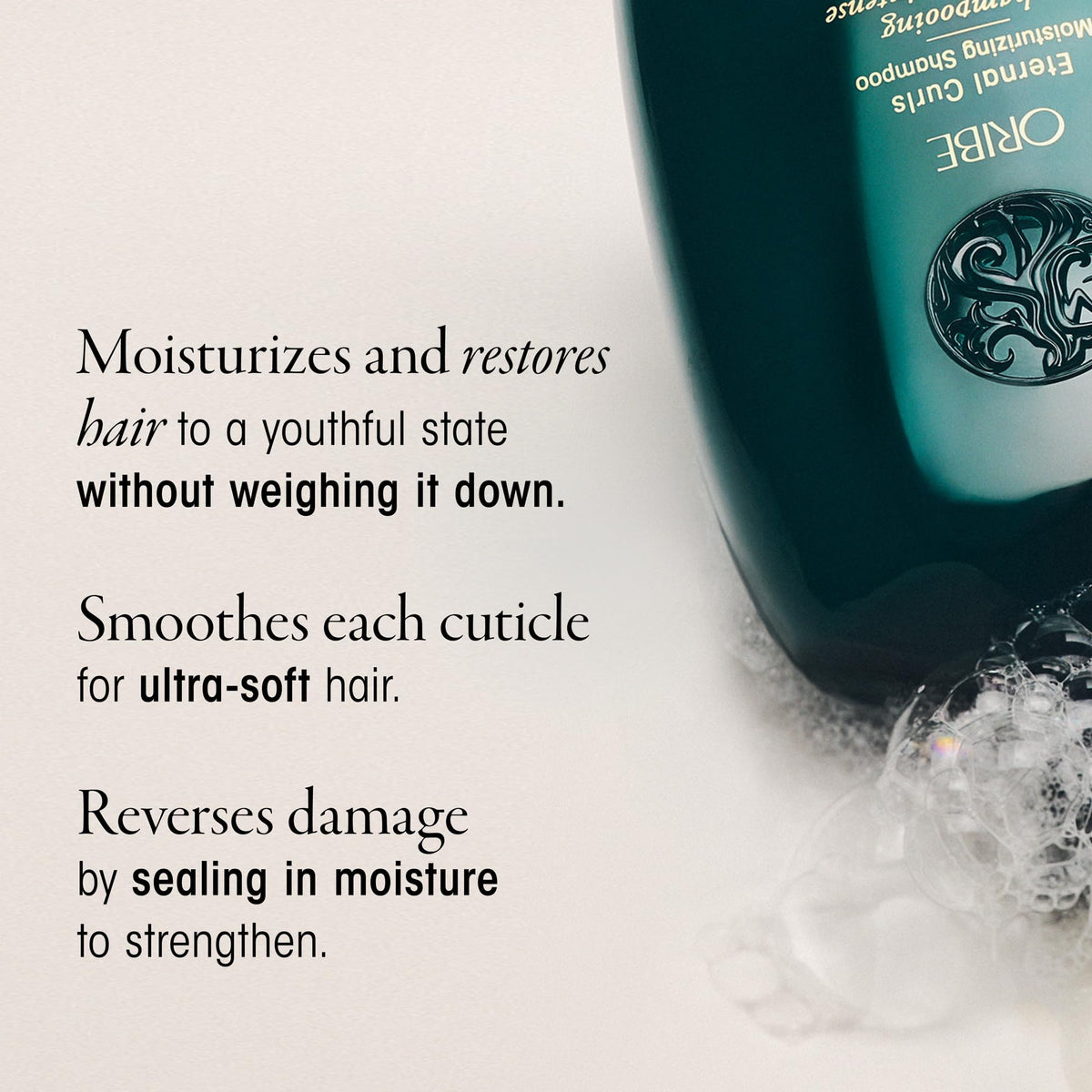 Oribe eternal curls shampoo applied to wet curly hair in hand for improved manageability