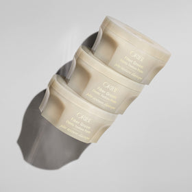 Oribe Fiber Groom texture close-up revealing fibrous paste for flexible hold