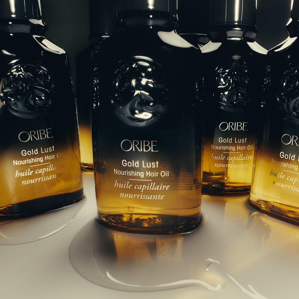 Oribe Gold Lust applied to damp hair showing smoother styling and hydration benefit
