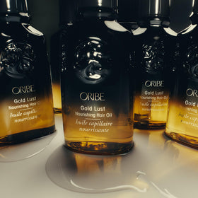 Oribe Gold Lust applied to damp hair showing smoother styling and hydration benefit