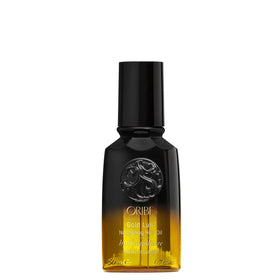 Oribe Gold Lust bottle front showing elegant packaging and luxurious benefit