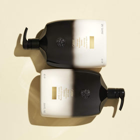 Oribe Gold Lust in salon use being massaged into hair for restoration benefits