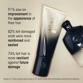 Oribe Gold Lust lather texture on hand showing gentle foam and cleansing power