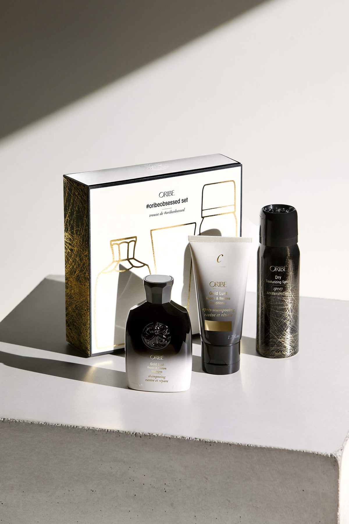 Oribe Gold Lust Shampoo close-up showing lather-friendly texture for gentle repair benefit