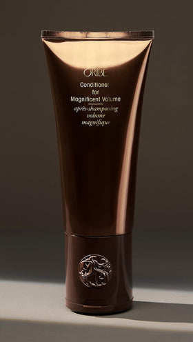 Oribe product label close-up highlighting ingredients and claims