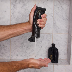 Oribe liter refill pouch beside standard bottle illustrating size and savings